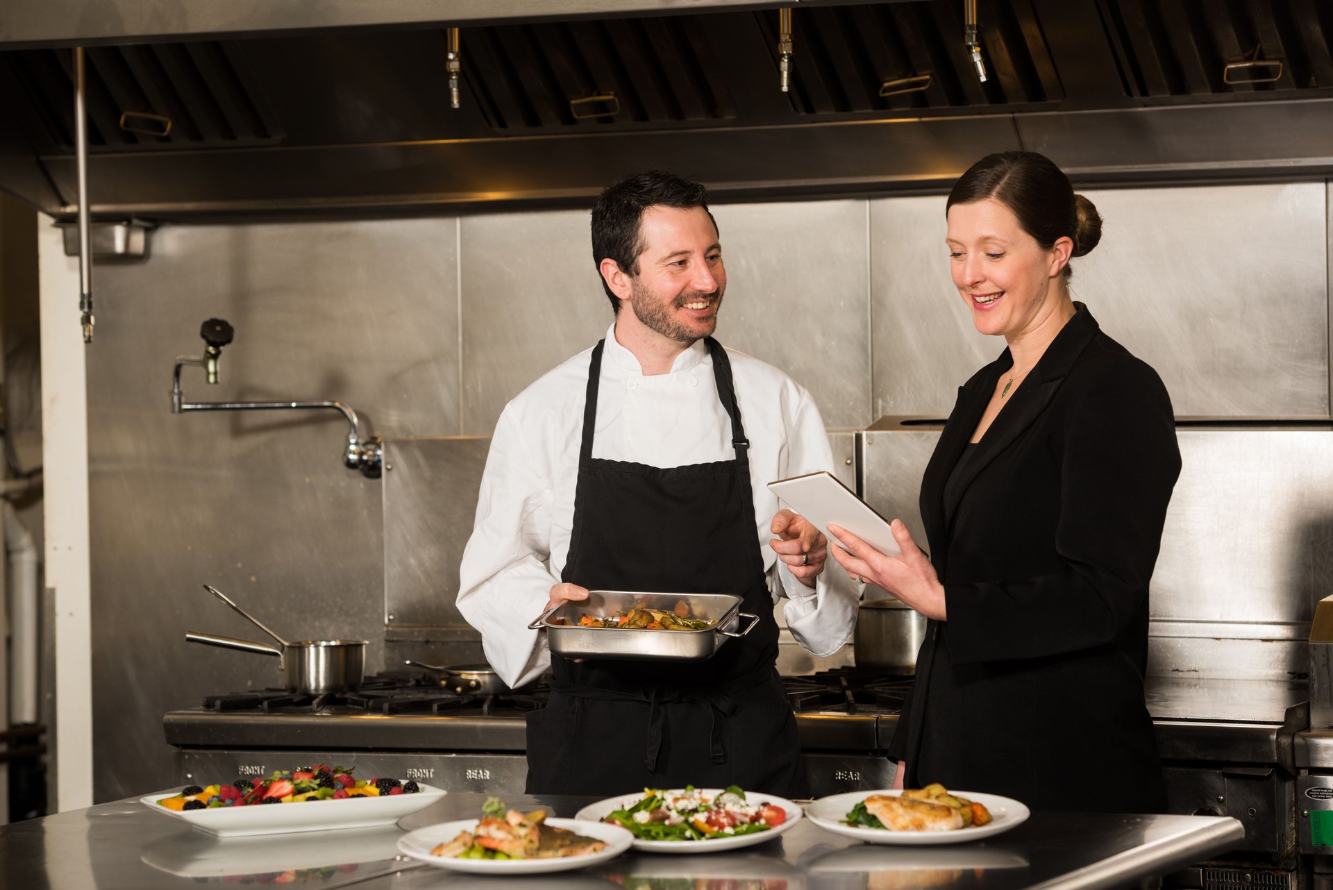 Restaurant manager working with a professional chef